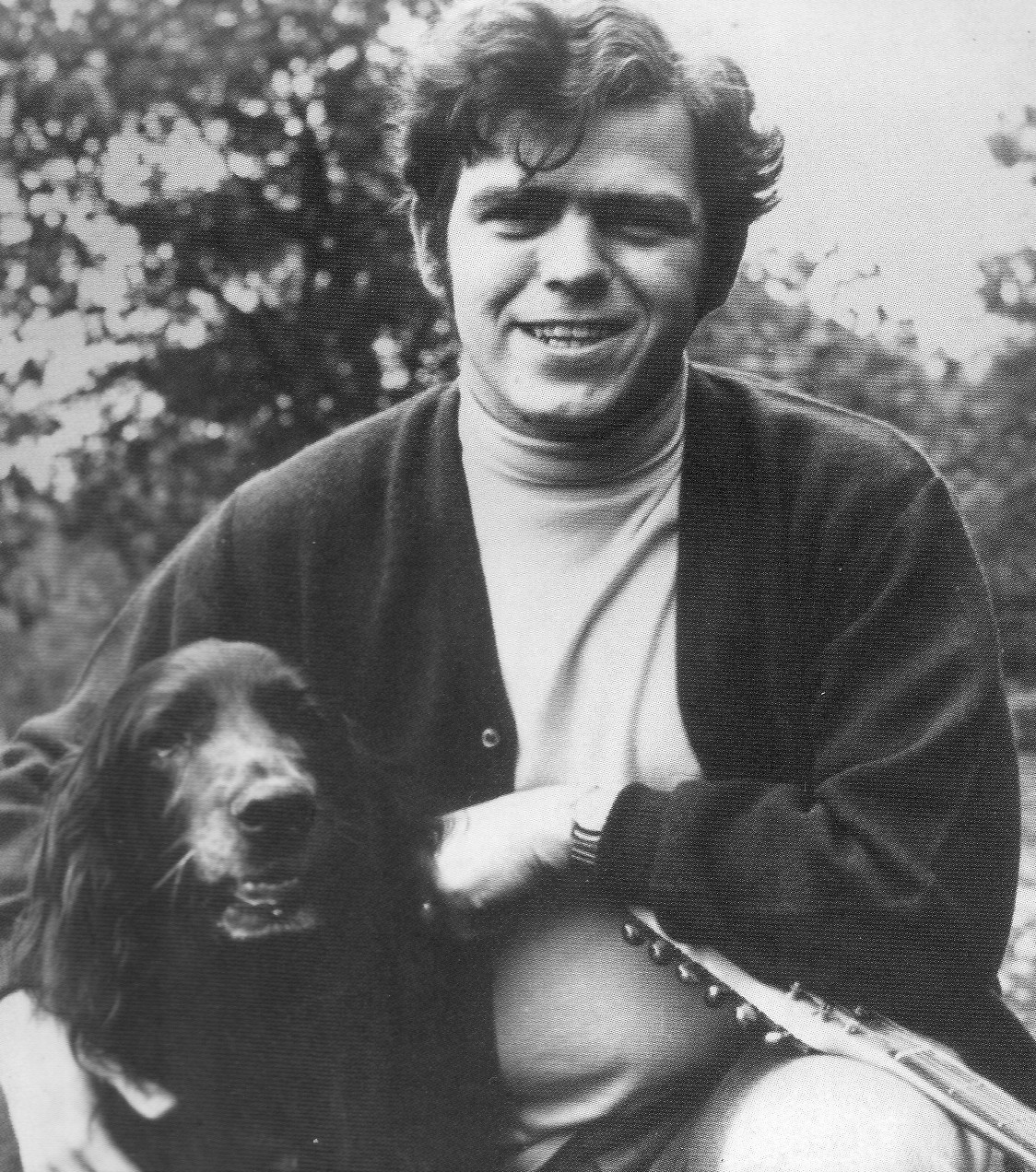 Photo: a younger Tim, with spaniel